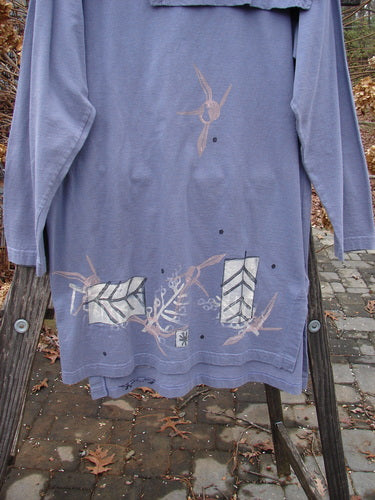1996 Trifocal Top Arrow Stratus Size 1: A funky, painted shirt with an abstract arrow design and a blue fish patch on the hem.