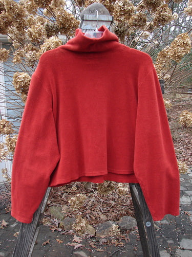 2000 Celtic Moss Big Collar Top in Sienna, size 2, on a wooden post