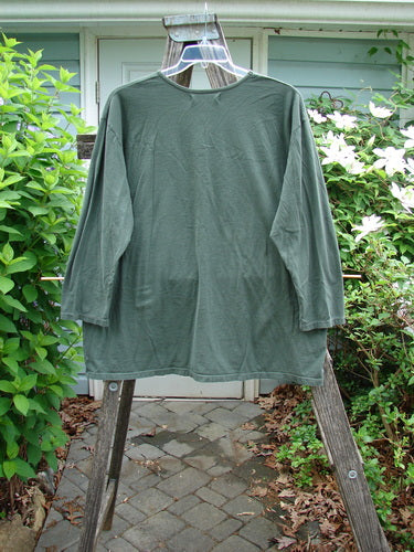 Barclay Long Sleeved Studio Tee Primitive Times Army Green Size 1, featuring a straight shape, long sleeves, and a rounded neckline, showcasing a Primitive Times theme paint, made from organic cotton.