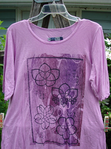 Barclay Slub Modal Three Quarter Sleeved Cafe Tee Lotus Pink Peony Size 0 features a rounded neckline, three-quarter sleeves, slight A-line flare, curly edgings, varying hemline, and lotus flower theme paint.