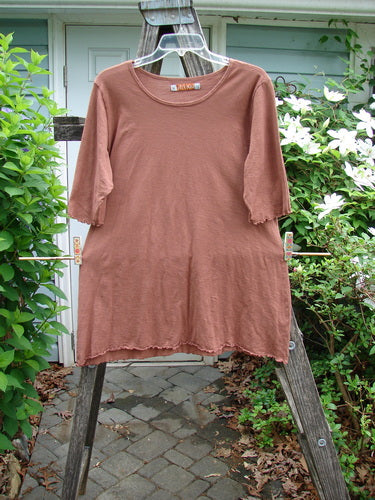 Barclay Slub Three Quarter A Lined Cafe Tee Unpainted Copper Size 1 features a rounded neckline, three-quarter sleeves, slight A-line flare, curly edges, and a varying hemline, highlighting its creative vintage style.