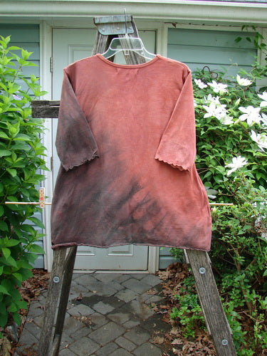 Barclay Three Quarter Sleeved Cafe Shadow Garden Mottled Burnt Orange Size 0 tee, featuring a sweeping A-line shape, rounded neckline, and curly edges, made from an organic cotton Lycra blend.