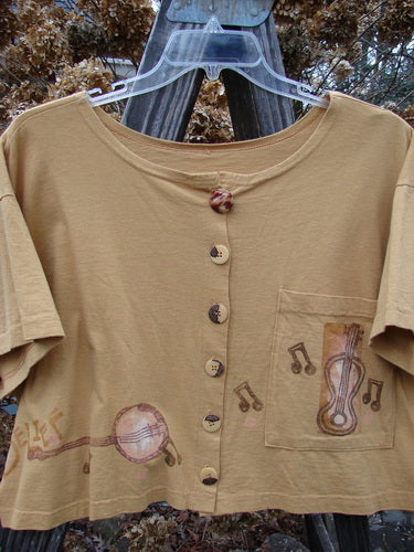 1994 Song Top with music-themed design, wide crop box shape, oversized buttons, and front pocket. Size 2. Perfect condition.