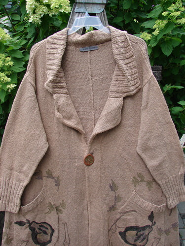 1998 Cotton Knit Canyon Cardigan Sweater Coat Pear Harvest Aspen OSFA, featuring a wide ribbed shawl collar, three-quarter sleeves, single oversized button, slouchy pockets, and subtle patterns near the hem, displayed outdoors.