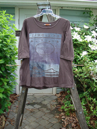 Barclay Three Quarter Sleeved Studio Tee Ex Libris Mocha Size 1 features a rounded neckline, slight A-line flare, and three-quarter sleeves, crafted from medium-weight organic cotton, embodying Bluefishfinder's vintage style.