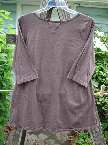 Barclay Three Quarter Sleeved Studio Tee Ex Libris Mocha Size 1, featuring a straight shape with slight A-line flare, three-quarter sleeves, rounded neckline, and artistic Ex Libris theme. Ideal for expressing individuality.