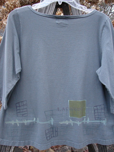 2000 Parklands Tee Top with graphic design, 3/4 length sleeves, and X stitched patches. Size 1.