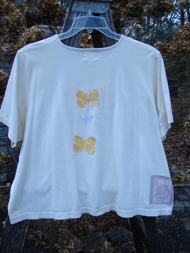 1999 Light Weight Short Sleeved Crop Tee with butterfly motif, made from organic cotton jersey. Size 2.
