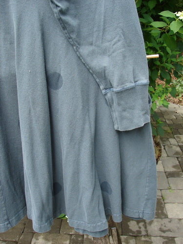 1996 Enchantment Dress Polka Path Mirror Size 2 displayed on a chair, showcases a ribbed turtleneck, empire waist, and sweeping lower design with polka path paint, highlighting Bluefishfinder's vintage charm.