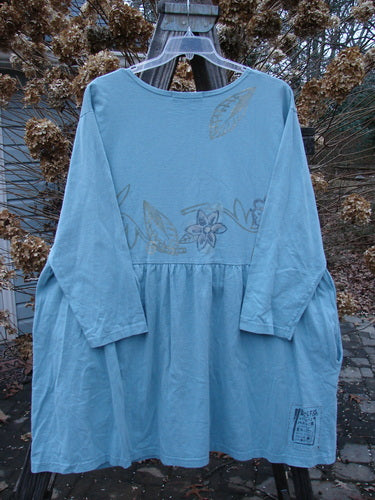 1995 Bric Brac Dress with flower watercolor print, size 1, featuring a flared lower, oversized pocket, and signature Blue Fish Patch.
