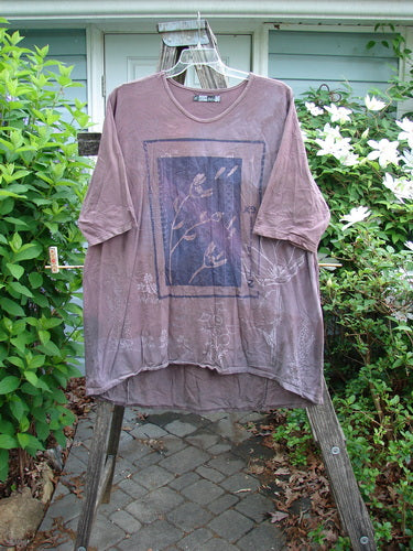 Barclay Tournesol Tunic Triple Stem Mottled Dark Rose OSFA features a tunic-length design with drop shoulders, three-quarter sleeves, a rounded neckline, and a unique hemline, embodying BlueFishFinder's vintage style.