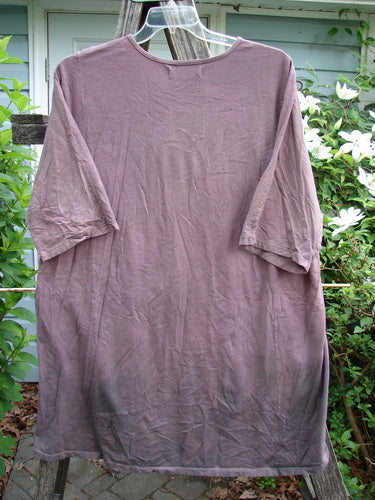 Barclay Tournesol Tunic Triple Stem Mottled Dark Rose OSFA, featuring a tunic length, drop shoulders, rounded neckline, and three-quarter sleeves, with a unique varying hemline, ideal for creative expression.