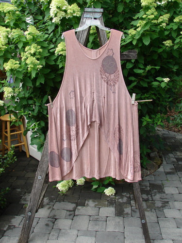 1999 Acetate Lycra Rosewater Sleeveless Pullover Circle Flower Rosetta OSFA displayed outdoors on a wooden frame, featuring a unique varying hemline, deeper neckline, and floral prints, embodying vintage Blue Fish Clothing style.