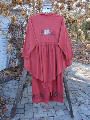 1997 Hearth Peplum Button Duo Vines Brick Size 2: Red dress and skirt on rack, with oversized buttons and garden theme paint.