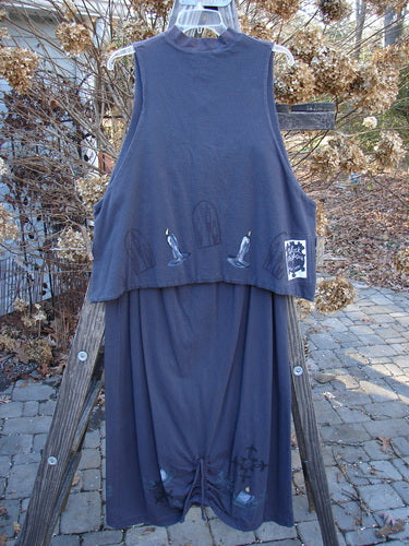 1999 Mandarin Winter Duo with Celtic Candle design, size 2. Blue dress on wooden ladder, Asian-inspired mock T neck, double-lined vest with Celtic Candle theme paint, and blue fish patch. Matching winter skirt with scooped front hemline and pegged shape.