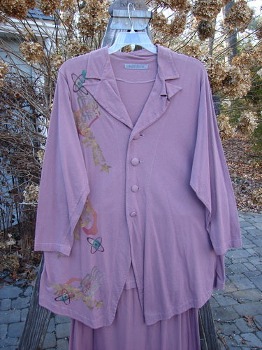 1996 Boulevard Festival Duo Laurel Size 1: A purple shirt with a design on it, part of the Summer 1996 Collection.