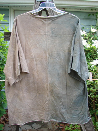 Barclay Raw Edge Flutter Collar High Low Top Library Mottled Latte OSFA features a rounded flutter neckline, raw edge dolman sleeves, wide boxy shape, and hi-low hemline, embodying BlueFishFinder's vintage creative style.