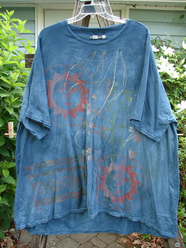 Barclay Art Tunic Sun Fellow Mottled Blue Mineral OSFA showcases a tunic with a rounded neckline, drop shoulders, loose three-quarter sleeves, and an artistic hemline, reflecting Bluefishfinder's unique vintage style.