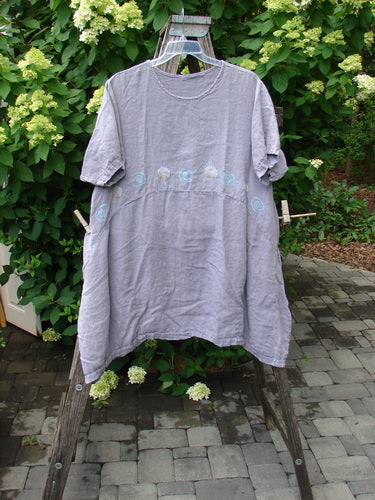 1997 Urchin Dress Sun Ray Swirl Sea Urchin Size 2, elegantly displayed on a hanger, features a loose fit, short sleeves, deep side pockets, and subtle midsection embroidery, embodying vintage Bluefishfinder style.