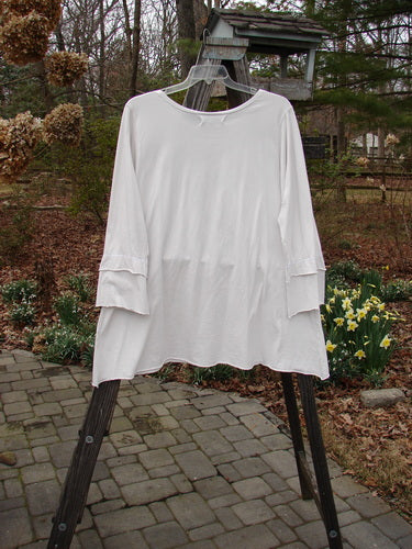Barclay NWT Petal Sleeve A Line Tunic Garden Visit White Jasmine Size 1, white shirt on rack with petal sleeves.