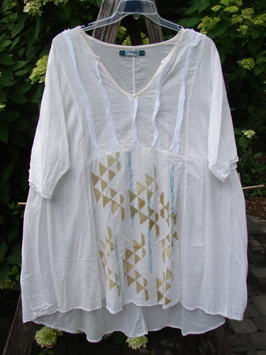 Barclay Batiste Flutter Bib Tie Back Dress in Triangular Geo White, Size 2, features a semi-sheer fabric with a relaxed A-line cut, subtle triangle motifs, and a shallow V-neck with tie detail.