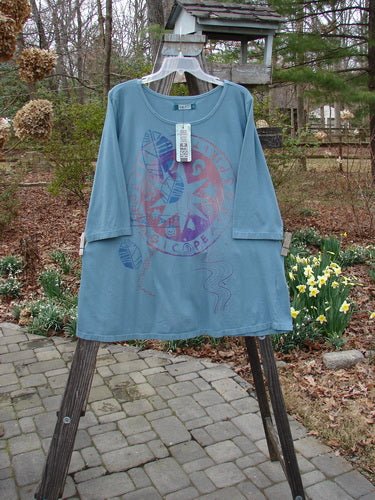 Barclay NWT Sunny Day Tunic with Belief Spirit Magic Medallion, size 2, featuring A-line shape and three-quarter sleeves.