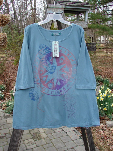 Barclay NWT Sunny Day Tunic with Belief Spirit Magic Medallion, size 2, featuring A-line shape, ribbed neckline, and three-quarter sleeves.