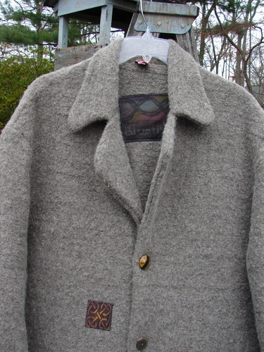 2000 Patched Spun Wool Cormac Coat Celtic Period Cloud Grey Size 1, a coat on a swinger with a logo and metal structure.