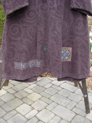Towel on rack, stone walkway, tattoo close-up, stone details, metal screw.