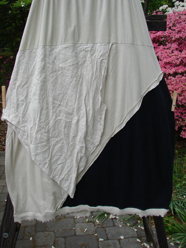 Image alt text: Barclay NWT Mixed Media Swatch Skirt, black and white skirt with layered upper, sectional panels, and vented hemline. Size 2.