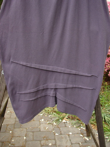 2000 Thermal Awen Skirt, Eggplant, Size 2: Full elastic waistband, generous bell shape, textured diagonal hemline. Perfect condition.
