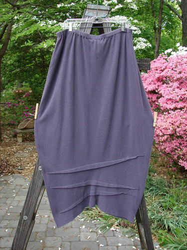 2000 Thermal Awen Skirt, size 2, in perfect condition. Made from heavy cotton thermal with a touch of Lycra. Features a full elastic waistband, generous bell shape, and textured diagonal hemline. Waist: 30-46, Hips: 56, Length: 34.