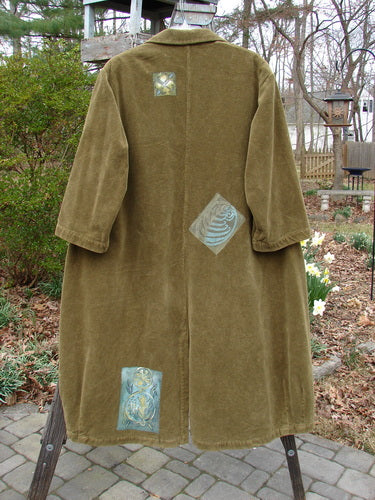 Vintage 1998 Patched Tapestry Coat with logo, swirl design, and close-up details.
