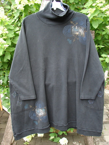Barclay Interlock Turtleneck Pullover Tunic Top Celtic Night Black Size 2 features a loose fit, ribbed turtleneck, graphic prints, and inset pockets, embodying Bluefishfinder.com's creative vintage style.