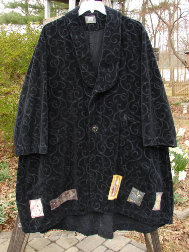 Vintage black coat with a unique swirl pattern, size 0, holiday style.