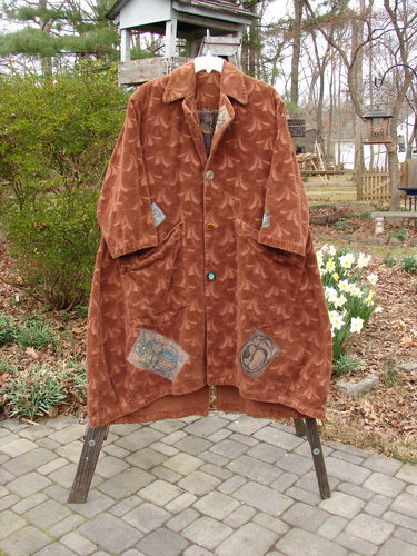 Vintage 1998 Patched Tapestry Coat with intricate designs and patterns, inspired by nature and artistry.