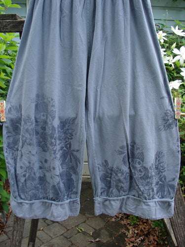 Barclay Lightweight Crop Nepenthe Pant in Mixed Garden Blue Grey Size 0, showcasing a sweet bottom flutter, thicker elastic waistline, and rolled raw lower panels, in a light wear and wash condition.