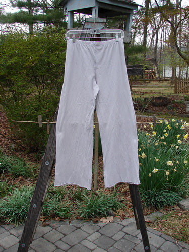 Barclay NWT Simple Cha Cha Pant Unpainted Ricepaper Size 0, hanging on a clothesline outdoors, showcasing slightly flared curly lowers and a shallow rise.