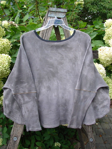 Barclay NWT Thermal Crop Top Belief Magic Mottled Spirit OSFA on hanger, showcasing a loose fit, A-line flair, drop shoulders, and waffle texture, highlighted against a rustic ladder and lush greenery.