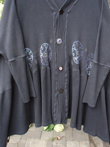 1997 Thermal Bungalow Jacket Celtic Medallion Cast Iron OSFA: A long-line cardigan with mismatched buttons, decorative circular motifs, flared hem, and deep V neckline, embodying BlueFishFinder's vintage creative style.