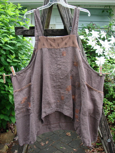 Barclay Linen Adjustable Snap Apron Jumper Playful Chirp Mocha Size 2, featuring adjustable shoulder snaps, pocketed upper bib, varying hemline, and playful birdie theme, showcasing unique vintage-inspired design from BlueFishFinder.com.