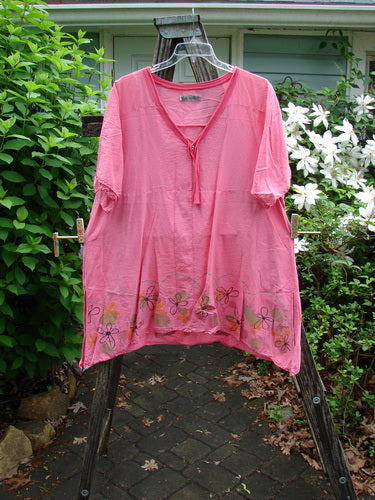 Barclay Batiste Deep Neck Sailor Tie Tunic Daisy Peony Size 2 features a deep V-neck with contrasting trim, raw-edged widening hemline, tiny vented sides, and an A-line flair.