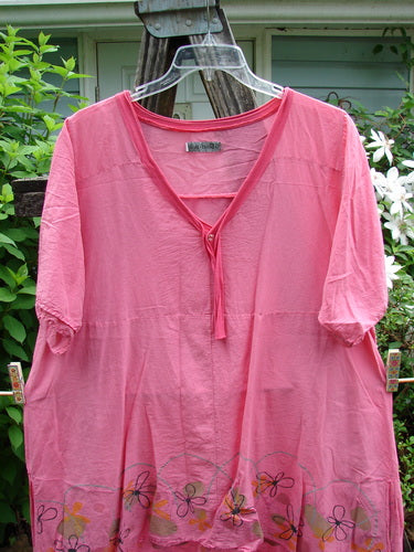 Barclay Batiste Deep Neck Sailor Tie Tunic Daisy Peony Size 2 features a deep V-neckline, widening hem with raw edges, tiny vented sides, and a sweet A-line flair, embodying Bluefishfinder.com's vintage style.