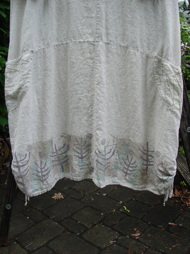 Barclay Linen Farmer Jen Dress Moon Path Flaxen Size 2, featuring a sectional bodice, wrap-around pockets, drawcord sides, scooped neckline, and A-line flair, perfect for vintage style expression.