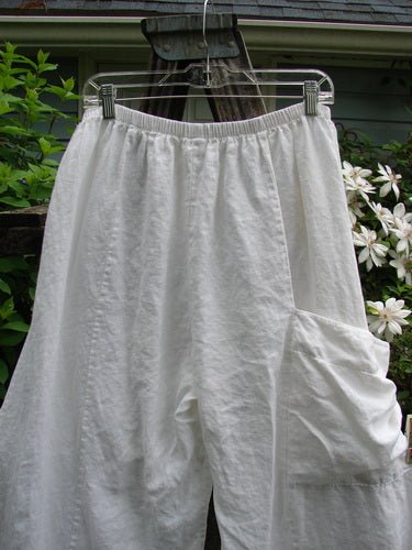 Barclay Linen Upper Dual Pocket Dimension Pant, Unpainted White Size 2, features a billowy flair, full elastic waistline, vertical seams, and distinctive double pockets, reflecting Blue Fish Clothing's vintage-inspired, creative style.