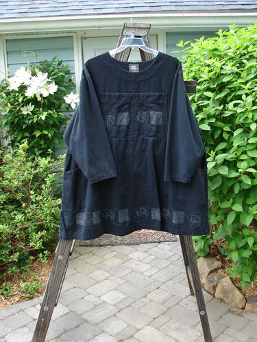1999 Denim Romper Tunic Dress with forest-themed spin design, featuring split bib pockets, cargo-style pockets, and rounded neckline. Size 2.