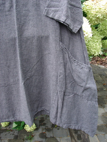 Barclay NWT Linen Cross Over Urchin Dress Stripe Mineral Size 1, draped on a bench, features a V-neckline, drop shoulders, curved empire waist, short sleeves, and large side pocket, embodying Bluefishfinder.com’s vintage style.