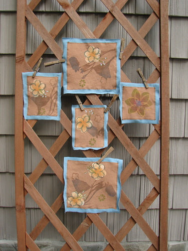 Image alt text: "A wooden lattice with fabric patches featuring a spring floral design from the PMU 2000 Spring Floral Patch Set"