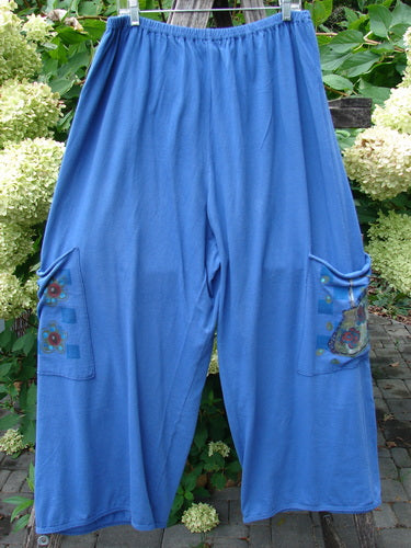 Barclay Drawstring Double Pocket Pant Shop Purse Skylark Size 2, featuring a loose fit with elastic waist, large patch pockets with floral details, and a cropped silhouette. Perfect for expressing creative individuality.