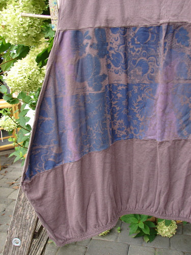 Barclay NWT Sprig Skirt Grid Garden Brown Sparrow Size 0, featuring a dusty-rose cotton base with a purple/blue damask panel, displayed draped over a bench, showcasing its boho style and elastic waist.